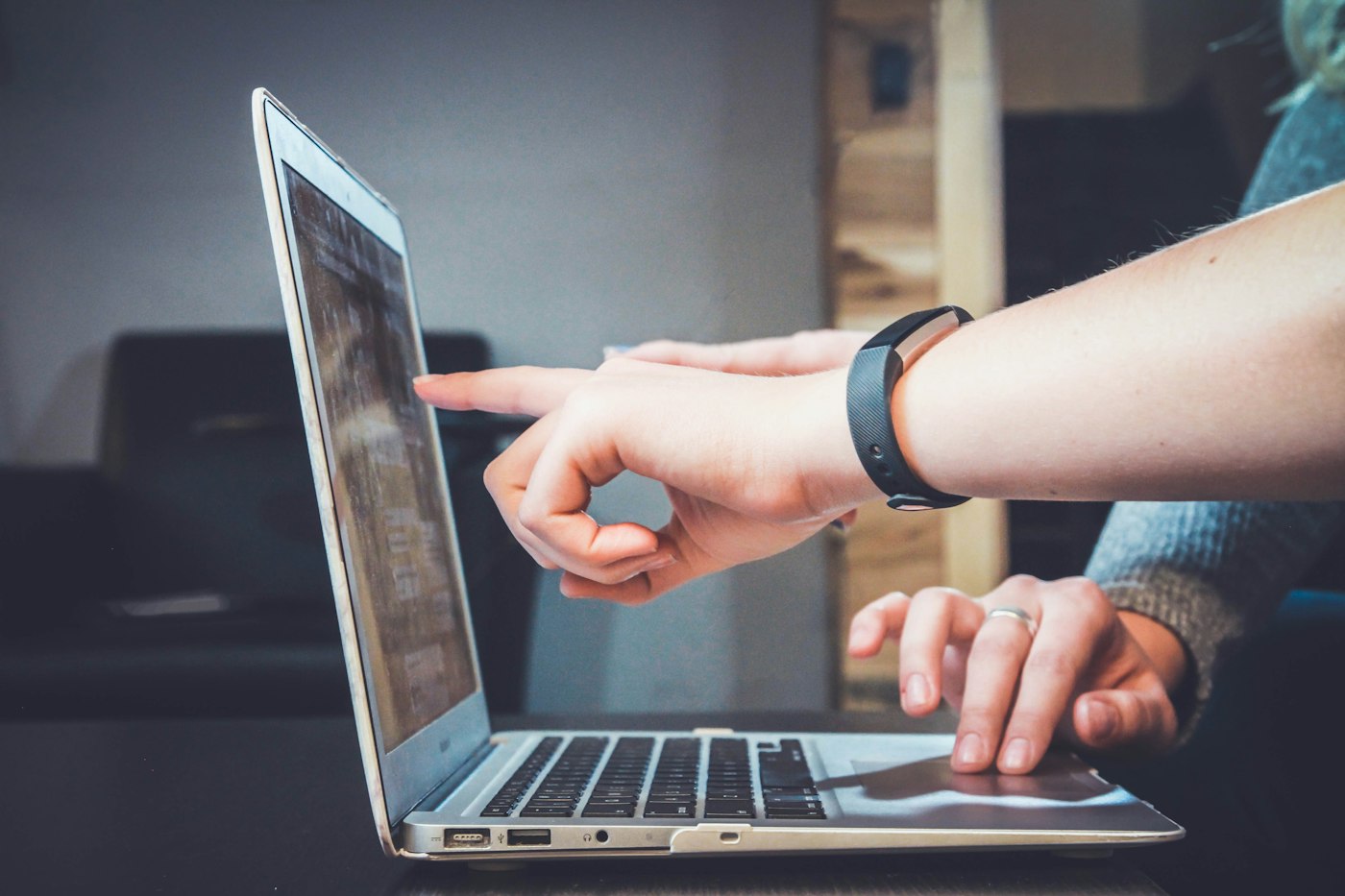Person using a laptop, suggesting computer-based study.